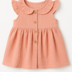 A beautiful pink frock for baby girls, made with soft cotton. Ideal for 6 to 24 months age group.