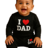 Person wearing a vibrant printed dress, smiling confidently – a visual that reflects the spirit of ‘LEELA Baby Wear’, a story of joyful style and fresh starts.”
