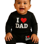 Person wearing a vibrant printed dress, smiling confidently – a visual that reflects the spirit of ‘LEELA Baby Wear’, a story of joyful style and fresh starts.”